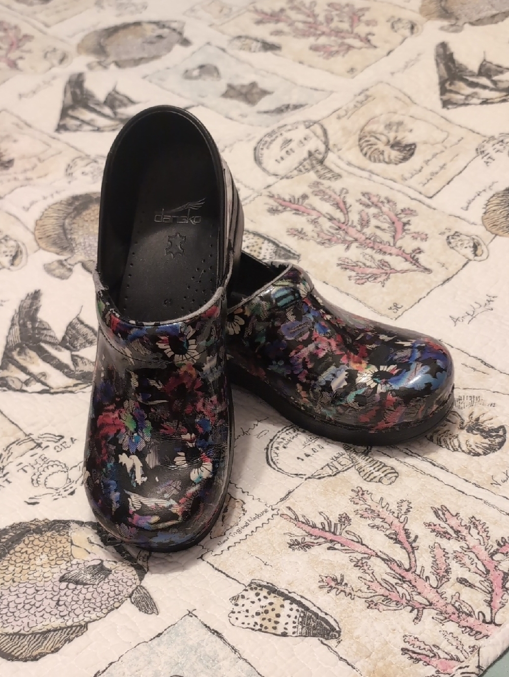 Dansko Black Floral Patent Clogs with Multicolor Accents